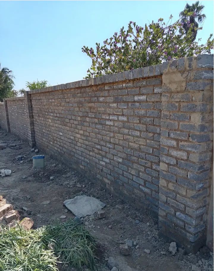 Detailed view of completed boundary wall brickwork